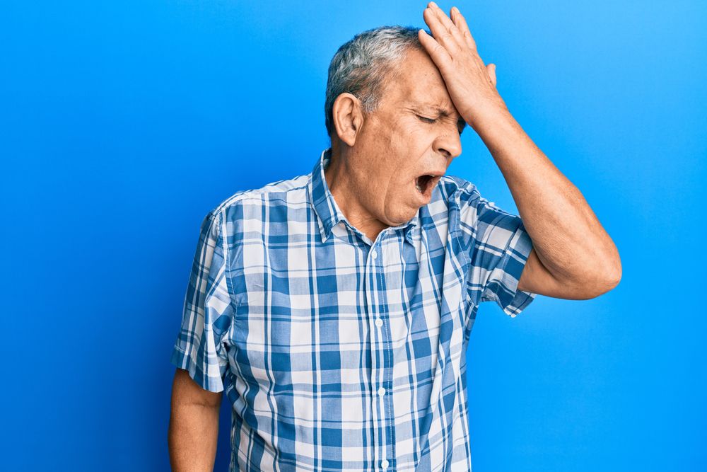 A man yawning