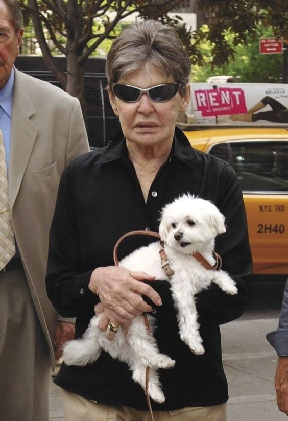 Woman holding a dog