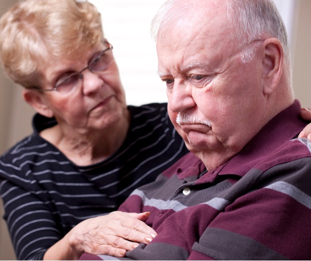 Elderly couple care giving
